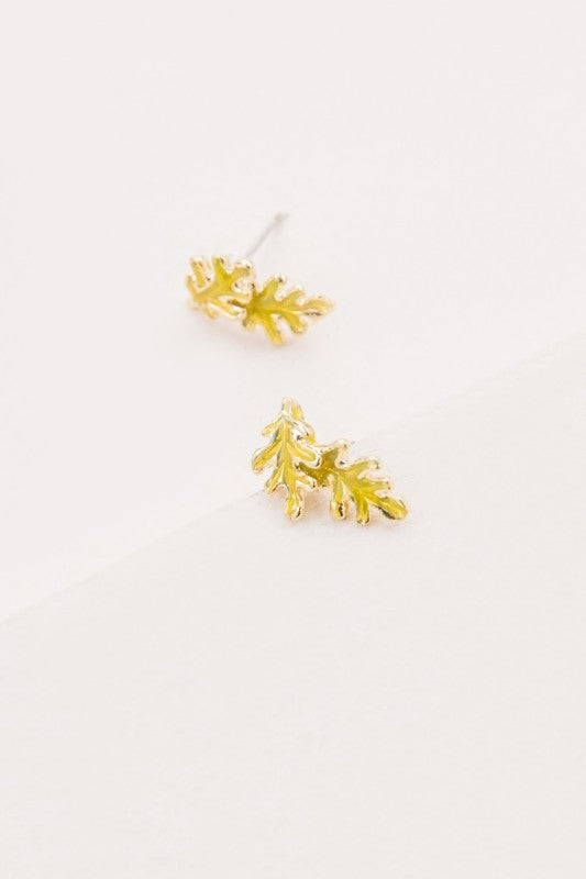 Bold color. Botanical charm. These Chartreuse Leaf Earrings bring a fresh pop of nature to your jewelry collection. With their vibrant hue and elegant leaf silhouette, they’re perfect for adding a playful yet refined touch to any outfit—whether you're headed to brunch, a garden party, or a tropical getaway.
