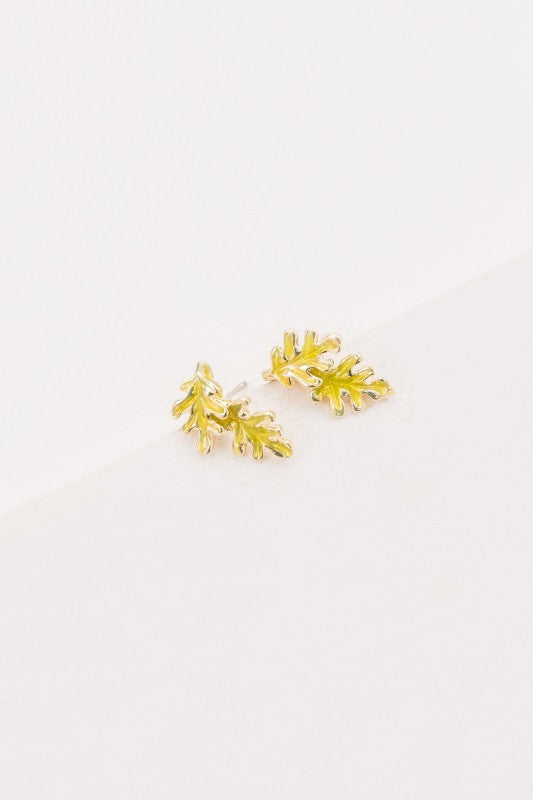 Bold color. Botanical charm. These Chartreuse Leaf Earrings bring a fresh pop of nature to your jewelry collection. With their vibrant hue and elegant leaf silhouette, they’re perfect for adding a playful yet refined touch to any outfit—whether you're headed to brunch, a garden party, or a tropical getaway.