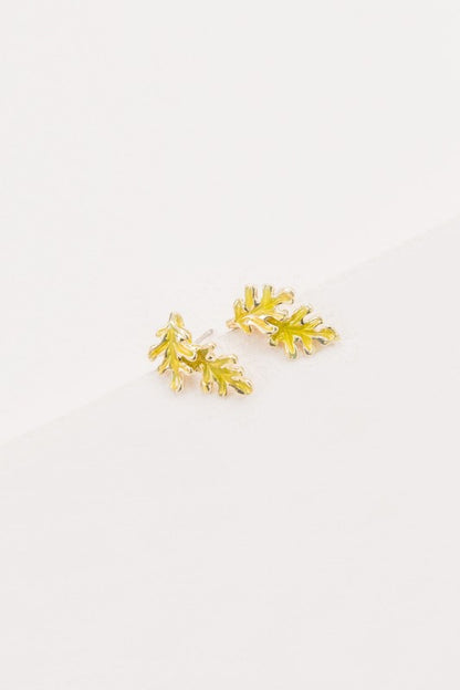 Bold color. Botanical charm. These Chartreuse Leaf Earrings bring a fresh pop of nature to your jewelry collection. With their vibrant hue and elegant leaf silhouette, they’re perfect for adding a playful yet refined touch to any outfit—whether you're headed to brunch, a garden party, or a tropical getaway.