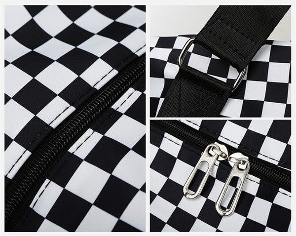 Checkered print duffel bag with a shoulder strap and top handles, ideal for gym or travel.