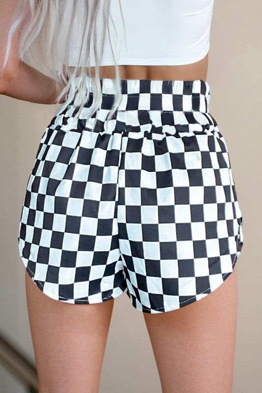 Bold pattern. Flattering fit. Everyday ease. These checkered high-waist shorts are your go-to for casual cool. With a classic print and a silhouette that hugs just right, they’re perfect for sunny strolls, coffee runs, or laid-back hangouts.