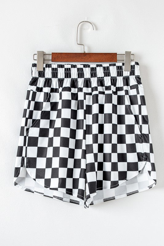 Bold pattern. Flattering fit. Everyday ease. These checkered high-waist shorts are your go-to for casual cool. With a classic print and a silhouette that hugs just right, they’re perfect for sunny strolls, coffee runs, or laid-back hangouts.