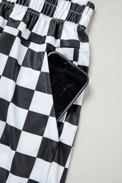 Bold pattern. Flattering fit. Everyday ease. These checkered high-waist shorts are your go-to for casual cool. With a classic print and a silhouette that hugs just right, they’re perfect for sunny strolls, coffee runs, or laid-back hangouts.