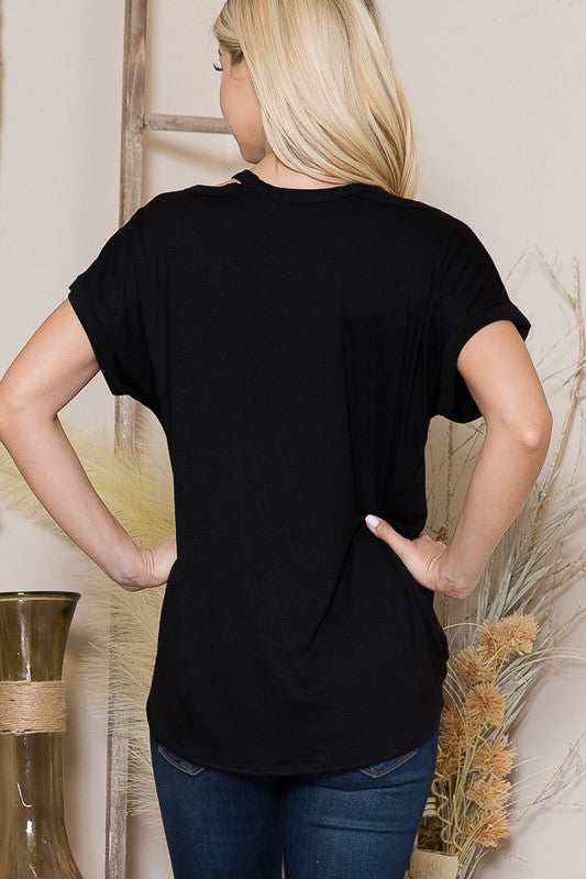 The wrap front defines curves, while shoulder cutouts bring just the right edge.