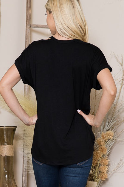 The wrap front defines curves, while shoulder cutouts bring just the right edge.