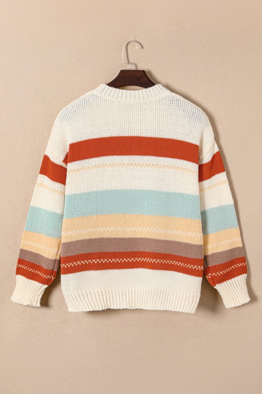 a Colorful Striped Knit Sweater on a wall