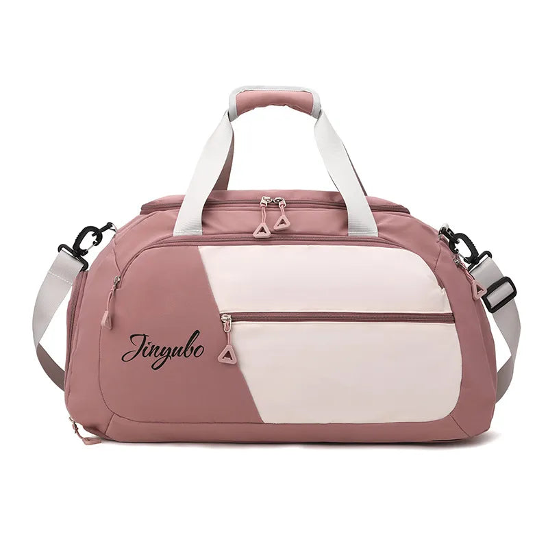 Dusty pink duffel bag with white accents, featuring white handles, a shoulder strap, and two front zippered pockets with triangular pink pulls. Branded "Jinyubo" in black script—modern, stylish, and perfect for gym or travel.