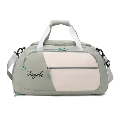 Stylish duffel bag with light gray and pale pink panels, white handles and shoulder strap, and light blue triangular zipper pulls. Branded "Jinyubo" on the front—modern, functional, and perfect for gym, travel, or everyday use.