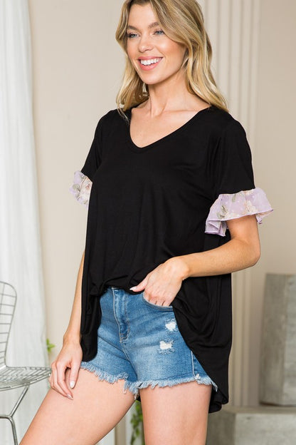 Subtle texture and bold sleeves make this top pop in any ensemble.