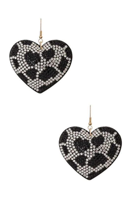 These Cow Print Rhinestone Heart Pillow Earrings are a wild mix of western charm and glam flair. Featuring plush heart-shaped pillows in black-and-white cow print, trimmed with rhinestones and suspended from comfy studs, they’re perfect for rodeo nights, festivals, or just showing off your bold side.