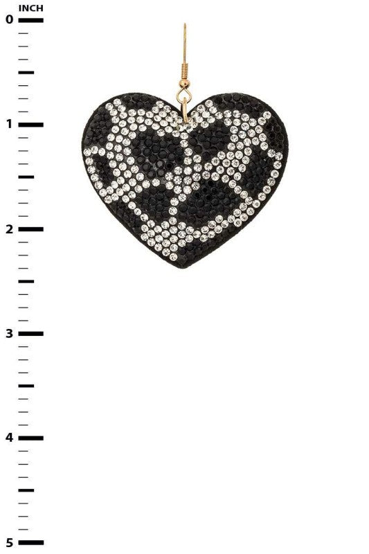 These Cow Print Rhinestone Heart Pillow Earrings are a wild mix of western charm and glam flair. Featuring plush heart-shaped pillows in black-and-white cow print, trimmed with rhinestones and suspended from comfy studs, they’re perfect for rodeo nights, festivals, or just showing off your bold side.