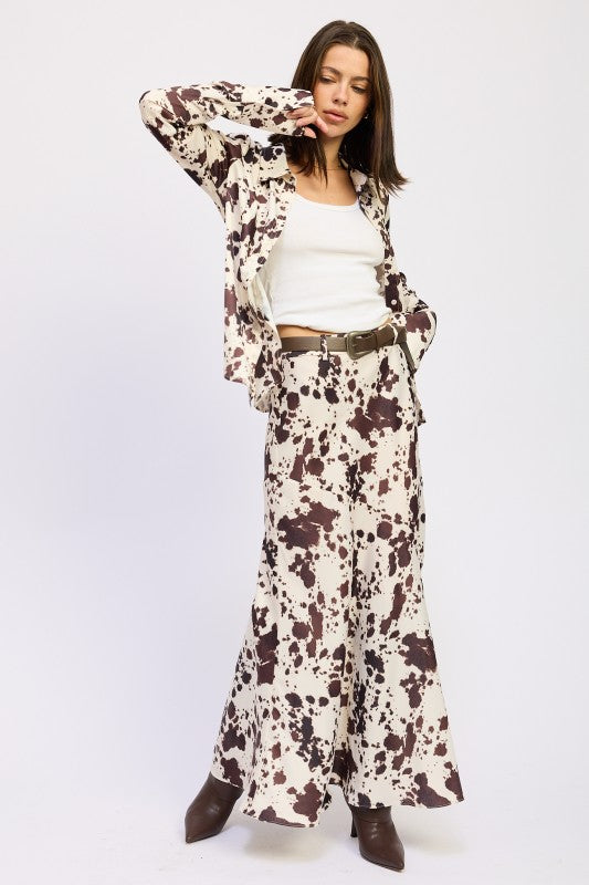 Button-down front for polished style and adjustable coverage. 