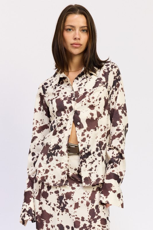 Bold cow-print satin fabric for a standout, fashion-forward look. 