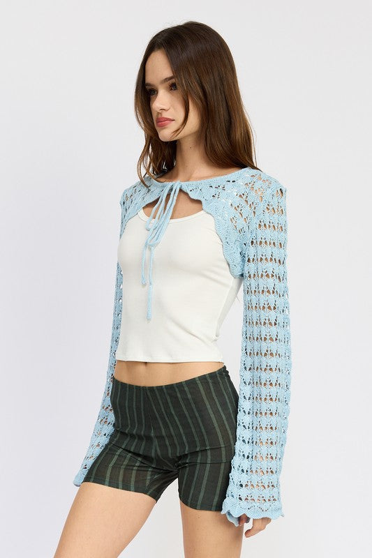 Delicate crochet detail shapes this bolero into a breezy accent piece.