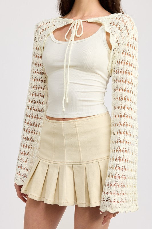 Crochet patterns and airy fabric create a romantic layer for every outfit.