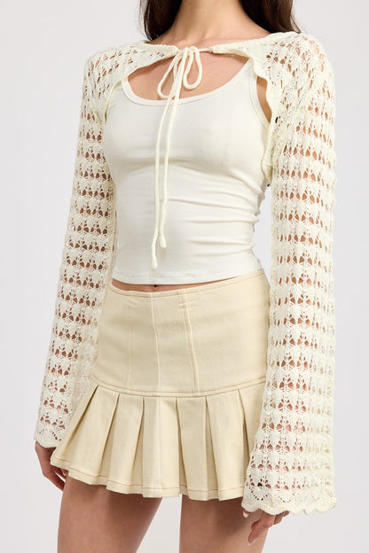 Crochet patterns and airy fabric create a romantic layer for every outfit.