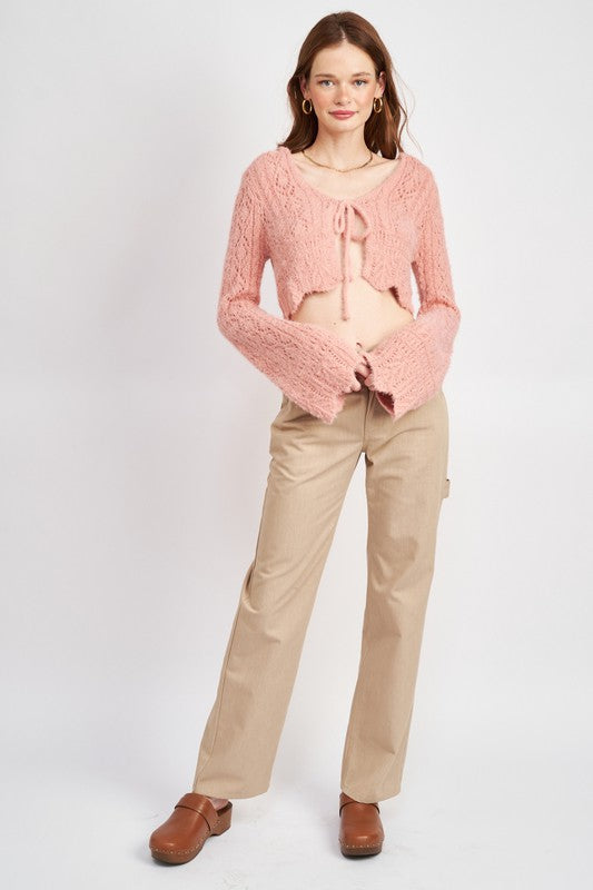 Flared sleeves give movement and visual interest to a classic crochet silhouette.