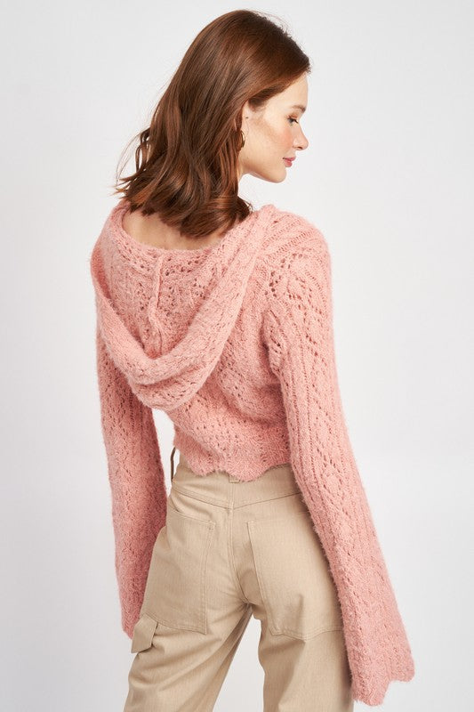The rich crochet detail elevates a casual crop into something special.