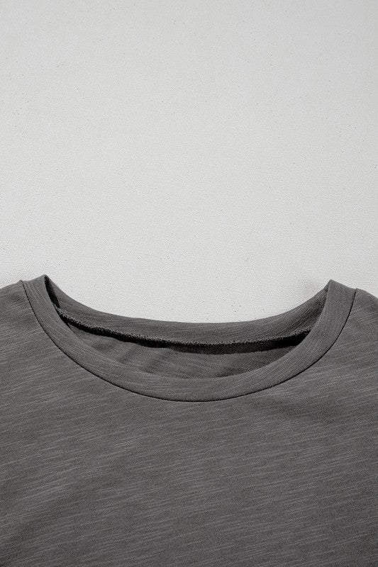 Shoulder seam and sleeve proportion styled to balance femininity with everyday wearability. (layered ruffle over the shoulder doesn’t overpower) 