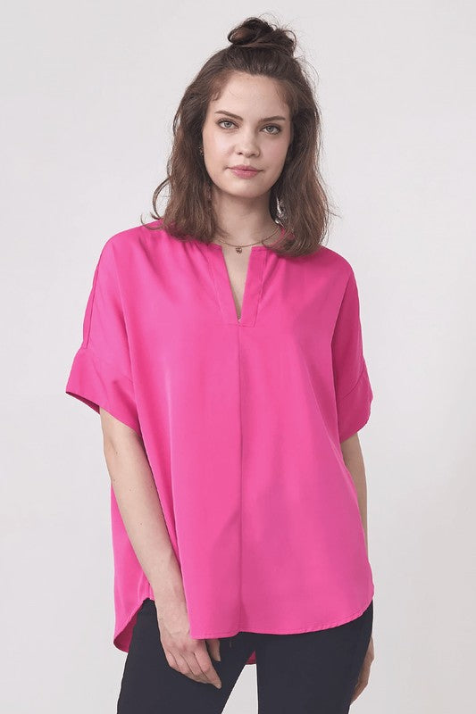 Split V-neckline adds a flattering, feminine touch. 