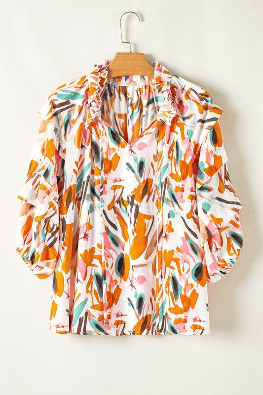 3/4 sleeves add coverage while keeping the silhouette light and airy. 