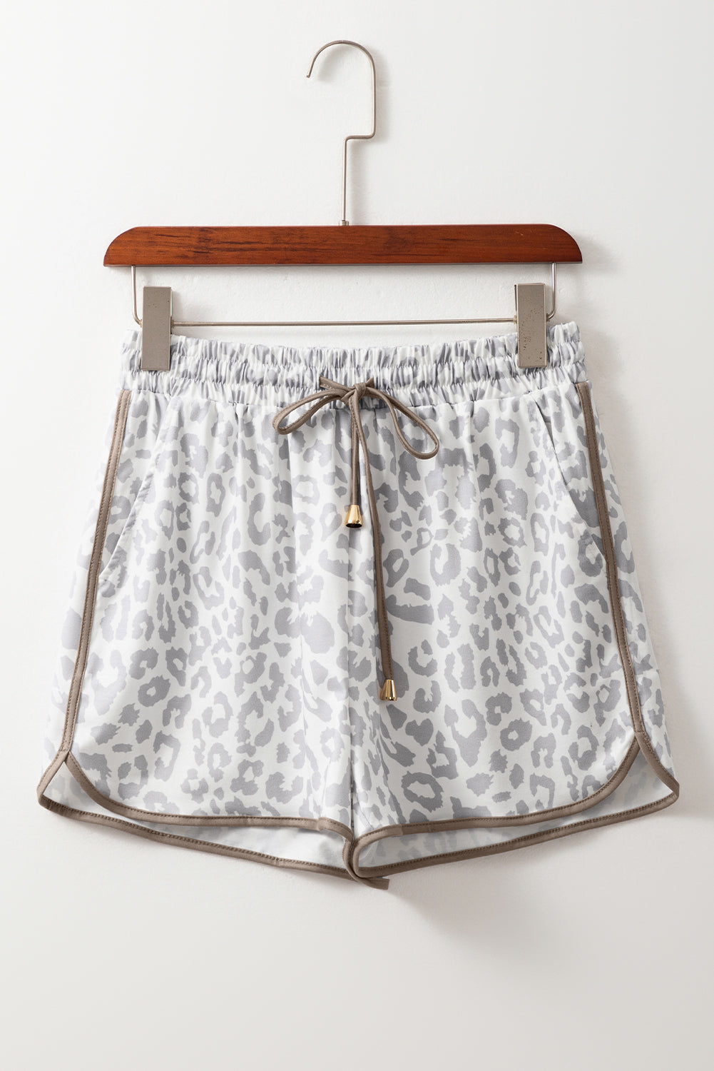 Unleash your wild side. These leopard-inspired shorts combine fierce style with laid-back comfort. Featuring a stretchy waistband, lace-up front, and bold contrast trim, they’re perfect for turning heads while keeping it casual.