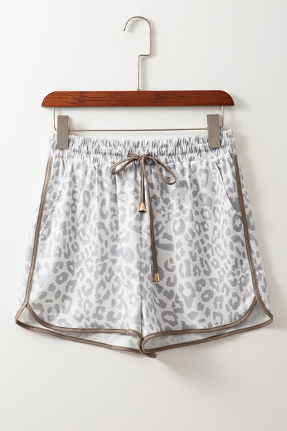 Unleash your wild side. These leopard-inspired shorts combine fierce style with laid-back comfort. Featuring a stretchy waistband, lace-up front, and bold contrast trim, they’re perfect for turning heads while keeping it casual.