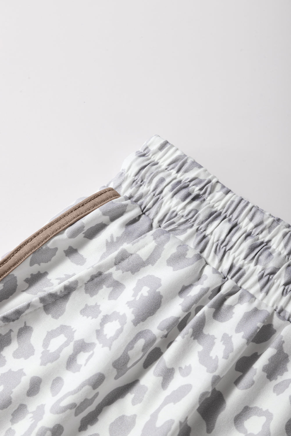 Unleash your wild side. These leopard-inspired shorts combine fierce style with laid-back comfort. Featuring a stretchy waistband, lace-up front, and bold contrast trim, they’re perfect for turning heads while keeping it casual.