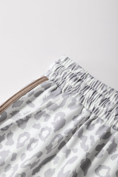 Unleash your wild side. These leopard-inspired shorts combine fierce style with laid-back comfort. Featuring a stretchy waistband, lace-up front, and bold contrast trim, they’re perfect for turning heads while keeping it casual.
