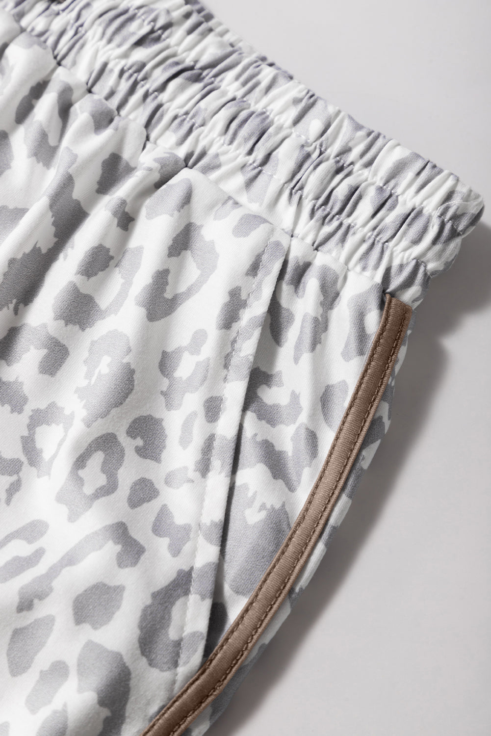 Unleash your wild side. These leopard-inspired shorts combine fierce style with laid-back comfort. Featuring a stretchy waistband, lace-up front, and bold contrast trim, they’re perfect for turning heads while keeping it casual.