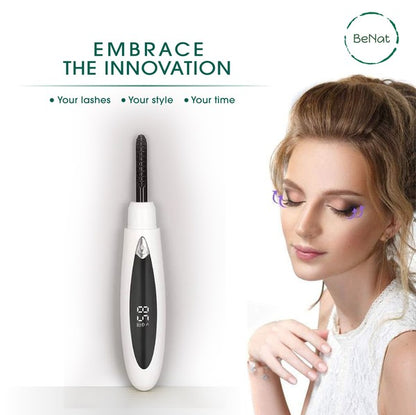 Electric eyelash curler with ergonomic design and USB charging port, ideal for achieving natural-looking curls.

