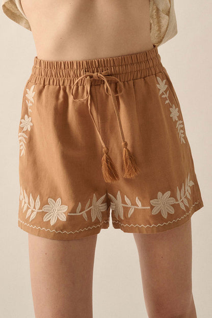 Khaki boho casual shorts with floral embroidery, tasseled drawstring, and elastic waistband for a comfy, chic summer look.