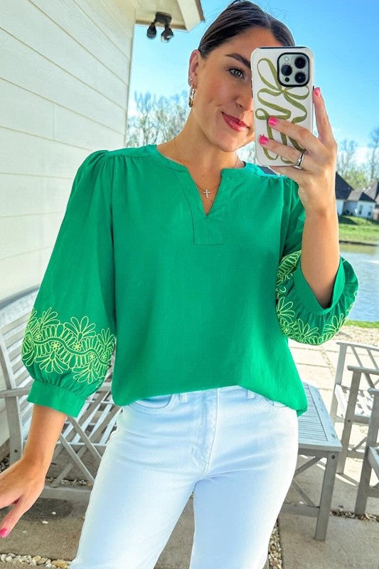 Subtle embroidery enhances the feminine appeal.