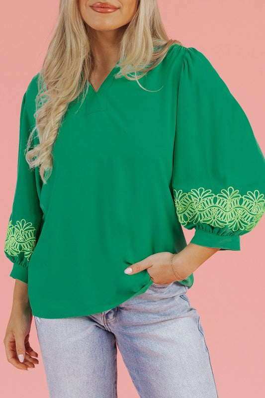Floral embroidery adds a delicate, elegant touch.