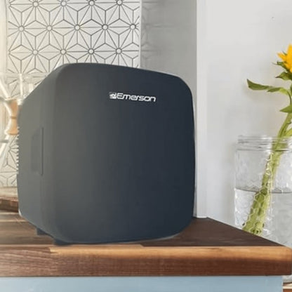 Compact black Emerson mini fridge with rounded edges, side ventilation, and front branding—designed for personal or small space use.