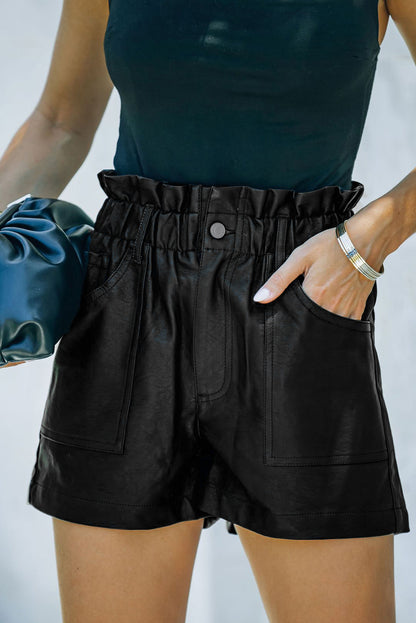 Sleek. Structured. Statement-making. These faux leather shorts bring high fashion to everyday wear with a flattering paperbag waist and a bold silhouette. Whether you're dressing up or keeping it casual, they’re your shortcut to instant edge.