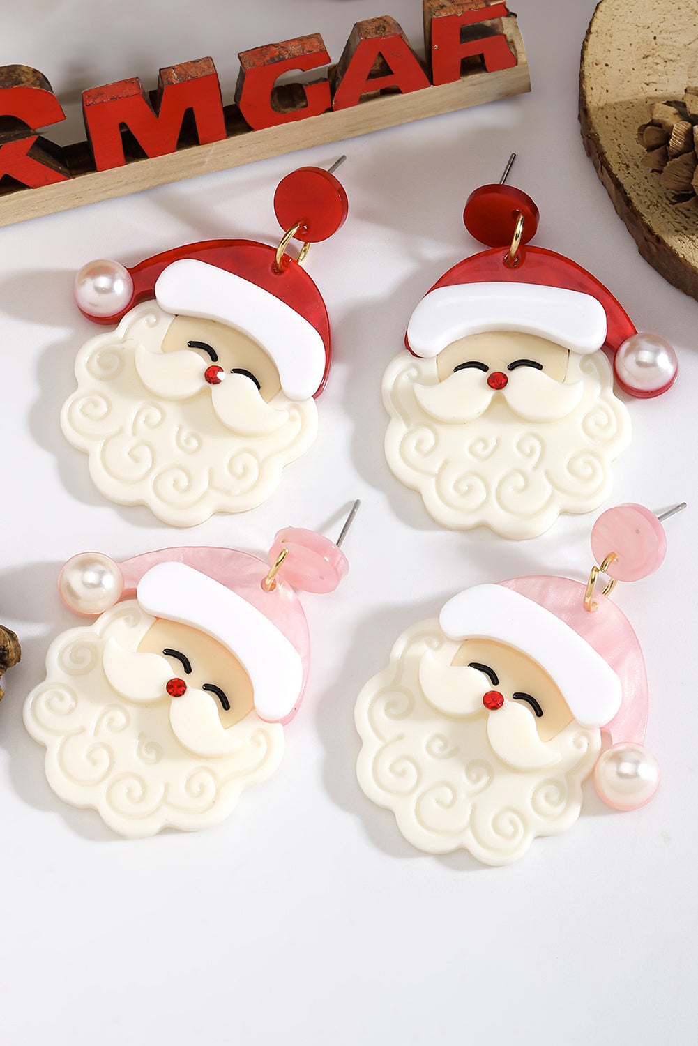 Jingle all the way—in style. These adorable Father Christmas earrings are the perfect way to add a little holiday cheer to your look. Featuring a fiery red base, bright pearl accents, and a charming Santa design, they’re festive, fun, and totally irresistible.