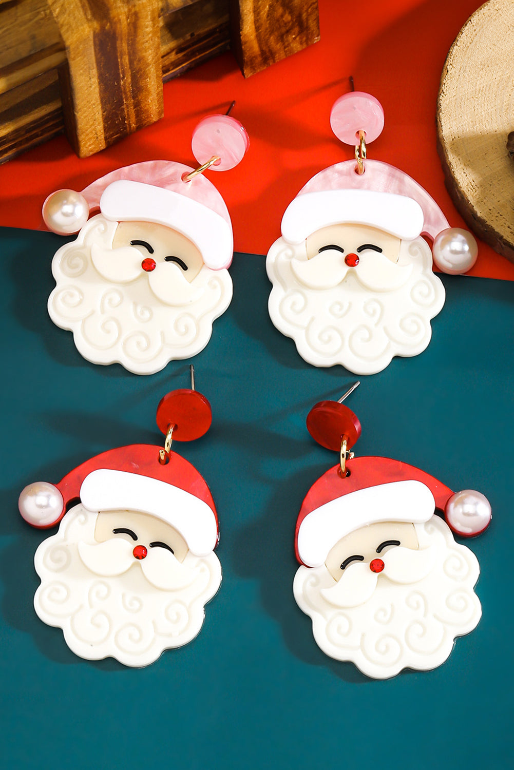 Jingle all the way—in style. These adorable Father Christmas earrings are the perfect way to add a little holiday cheer to your look. Featuring a fiery red base, bright pearl accents, and a charming Santa design, they’re festive, fun, and totally irresistible.