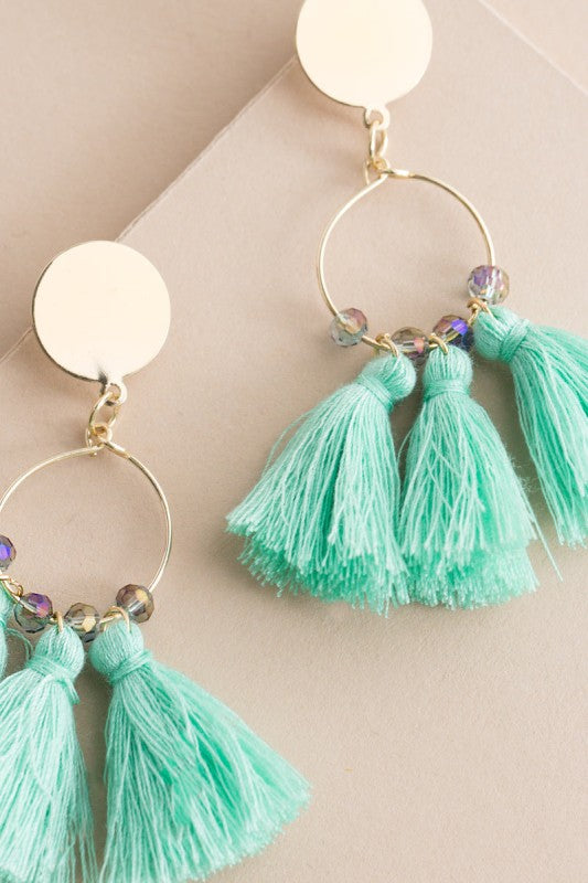Fresh color. Flirty movement. These Flirty Tassel Earrings in Mint Green are designed to dance with every step. Featuring silky threads in a breezy hue, they’re perfect for brunch dates, beach days, or anytime you want to add a playful pop to your look.