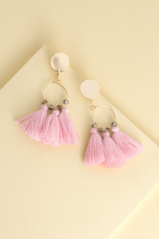 Soft sway. Bold play. The Flirty Tassel Earrings in Pink are designed to dance with every step. Featuring silky threads in a vibrant blush hue, they’re perfect for brunch dates, beach days, or anytime you want to add a playful pop to your look.