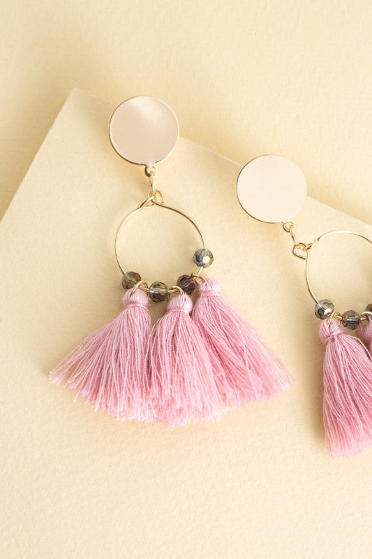 Soft sway. Bold play. The Flirty Tassel Earrings in Pink are designed to dance with every step. Featuring silky threads in a vibrant blush hue, they’re perfect for brunch dates, beach days, or anytime you want to add a playful pop to your look.