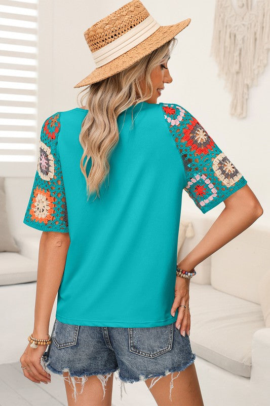 Lightweight, flattering, with sleeves that whisper “boho elegance.”