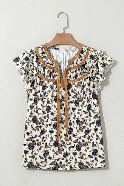 Frilly ruffles enhance the feminine charm.