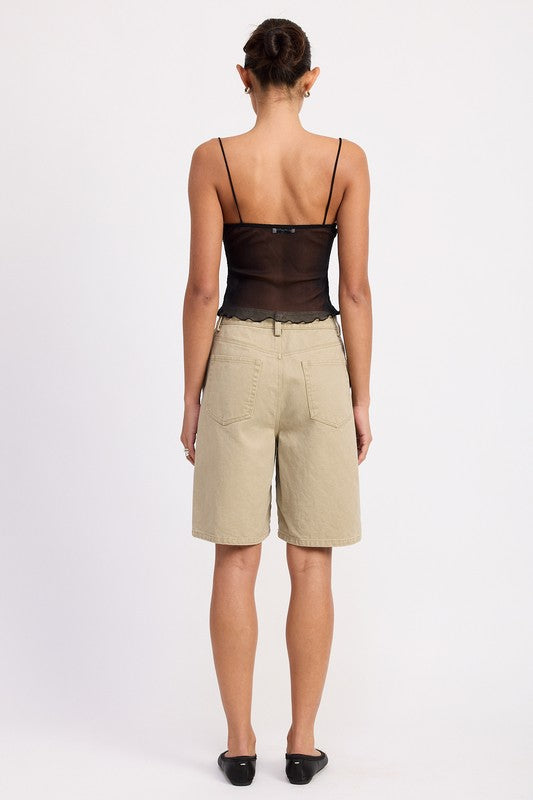 Perfect for layering under jackets or cardigans when you want a peek of something flirty. (Styling idea)