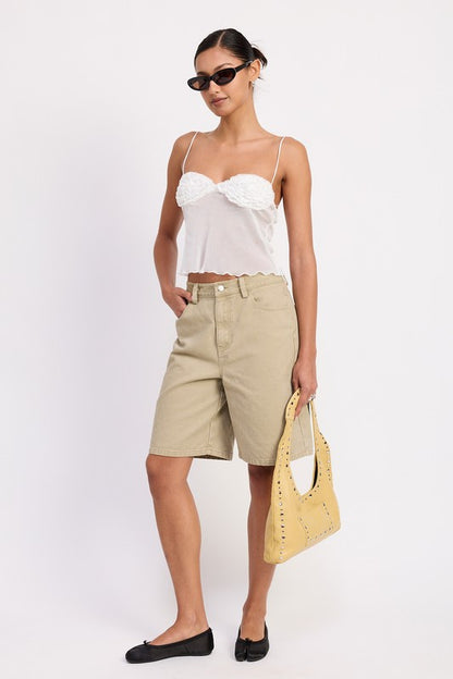 Lined floral cup piece adds modesty where needed while keeping flair. 