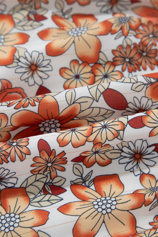 Floral midi dress with V-neckline, ruffle long sleeves, and tiered hem—ideal for spring events and casual outings