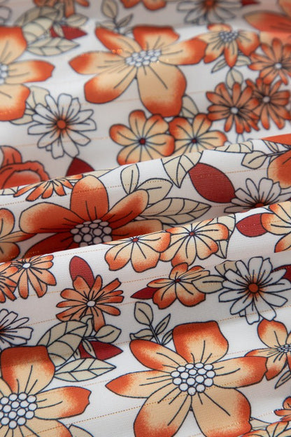 Floral midi dress with V-neckline, ruffle long sleeves, and tiered hem—ideal for spring events and casual outings