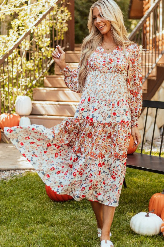 Floral midi dress with V-neckline, ruffle long sleeves, and tiered hem—ideal for spring events and casual outings
