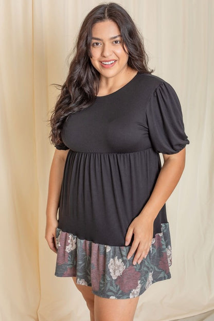 Woman wearing a Floral Two Tone Tiered Mini Dress