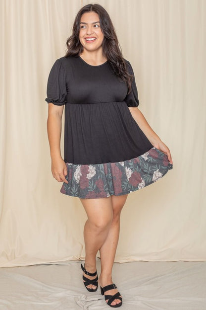 Woman wearing a Floral Two Tone Tiered Mini Dress